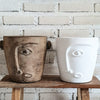 Pottery With Carved Faces