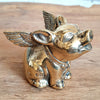 Brass Winged Pig