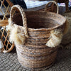 Natural Woven Banana Leaf Round Basket With Grass Pom-Poms - Canggu & Co