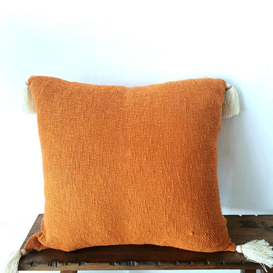 Orange Colored Raw Cotton Cushion With Tassels