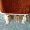 Brick Red Raw Cotton Throw With Natural Beaded Tassels - Canggu & Co
