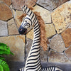Tall Carved Wooden Sitting Zebra - Canggu & Co