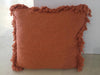 Various Orange & Rust Colored Raw Cotton Cushions With Fringe