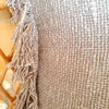 Various Silverish Colored Raw Cotton Cushions With Fringe