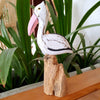Carved Wooden White Pelicans